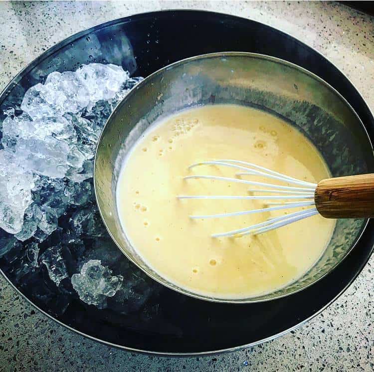 Creme Anglaise Creme anglaise cooling in a bowl with ice