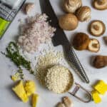 ingredients for wild mushroom risotto on kitchen counter top