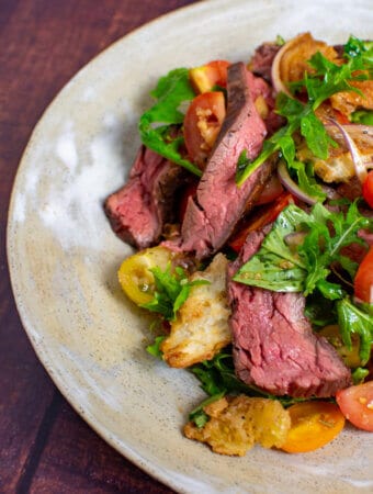 Panzanella steak salad in a bowl