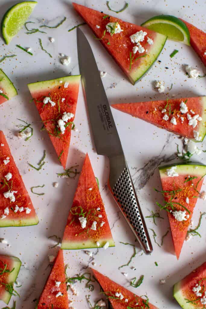 watermelon topped with togaroshi, mint & feta. Global GS-60 knife