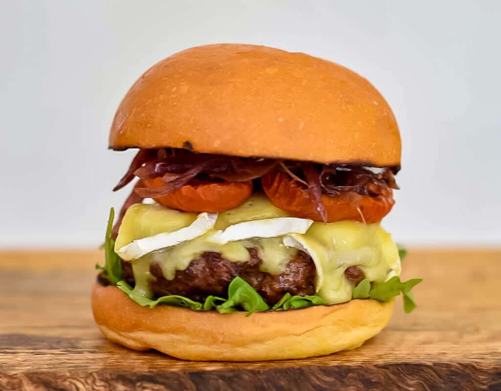 Organic Beef Burger organic beef burger,brie, slo roasted tomatoes & onion marmalade