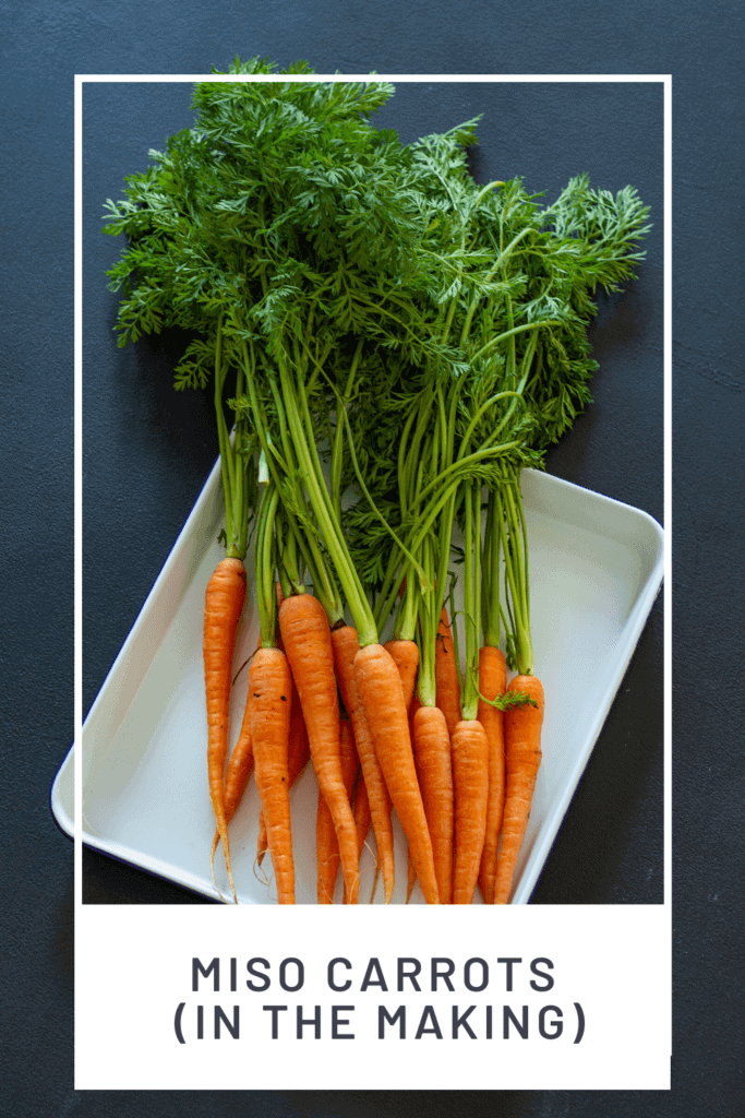 raw carrots on a baking tray