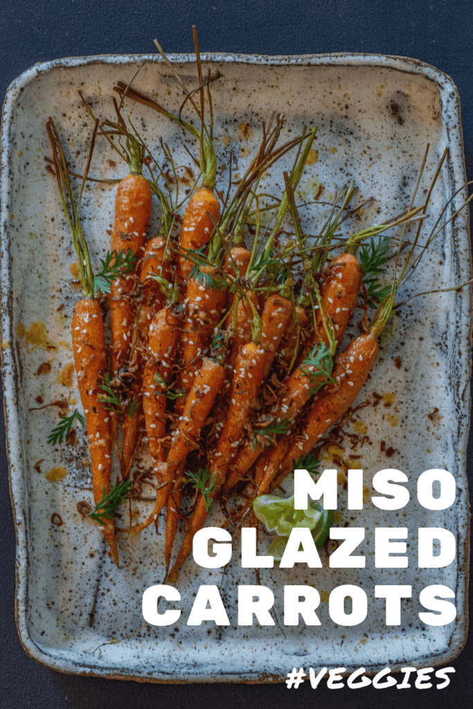 roasted miso maple carrots on a white serving plate