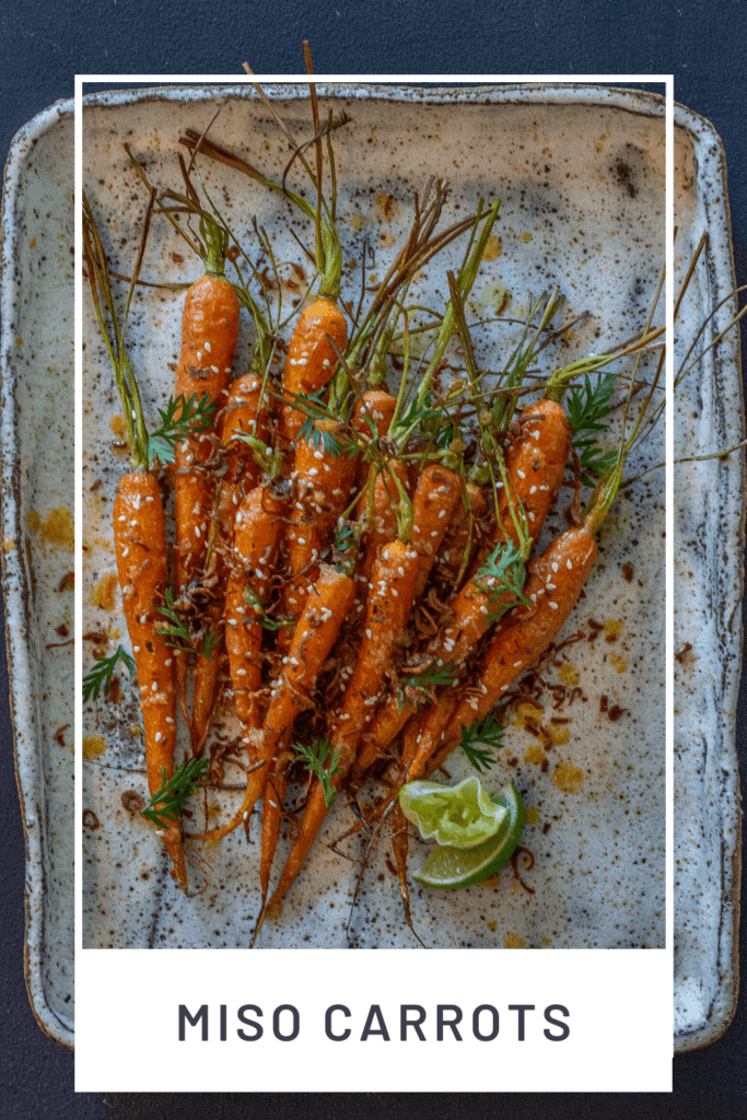 roasted miso maple carrots on a white serving plate