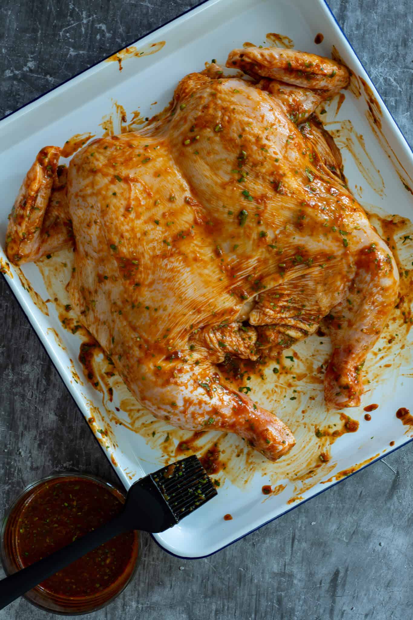 BBQ Korean Chicken being marinated on a while tray