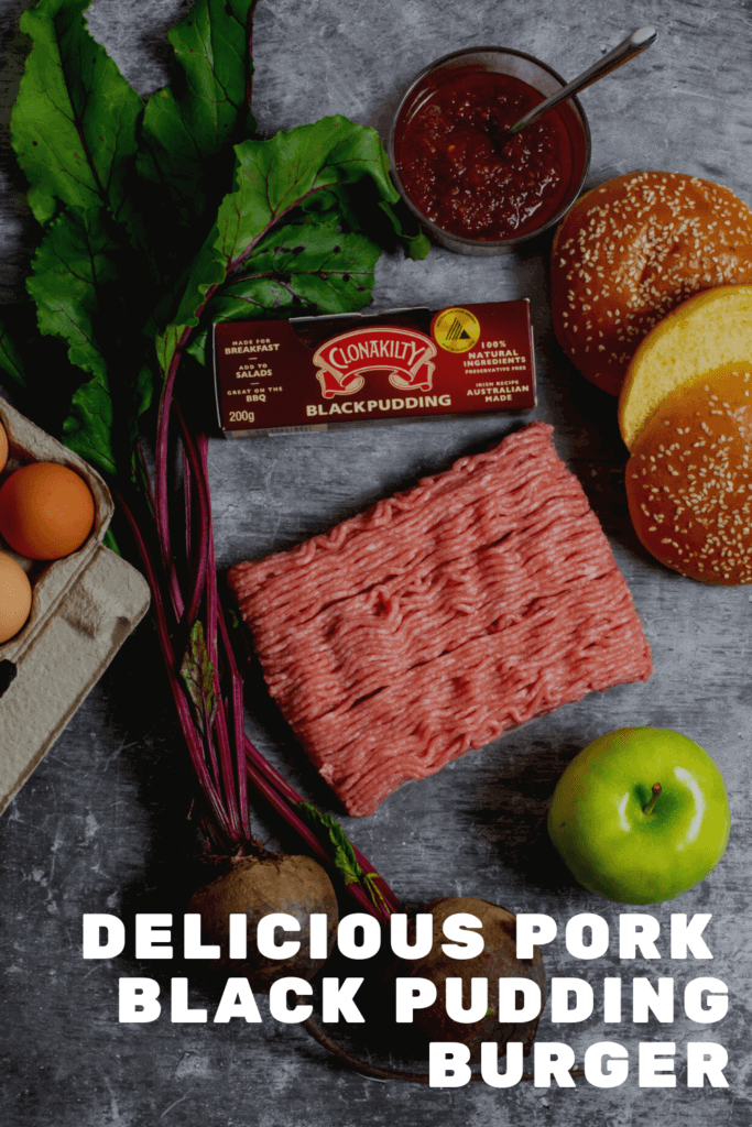 Pork mince, beetroot, apple, black pudding and eggs on a board