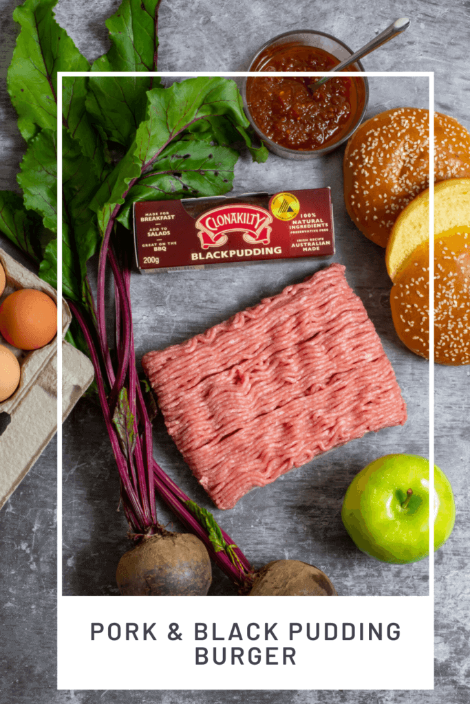 Pork mince, beetroot, apple, black pudding and eggs on a board