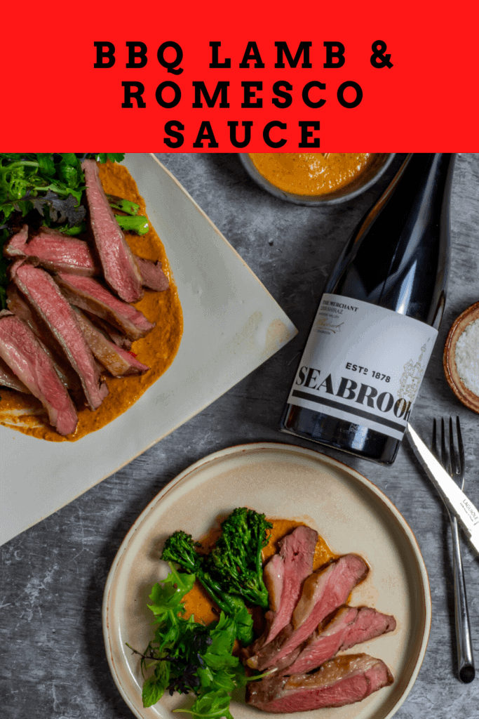 Seabrook wine shiraz, wine decanter, cooked lamb, macadamia romesco sauce & charred broccolini on a table