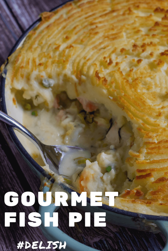 cooked fish pie on wooden board