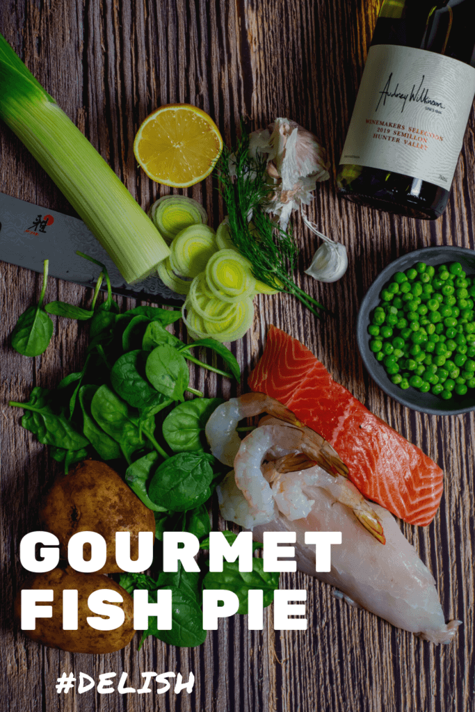 Fish pie ingredients and a bottle of wine