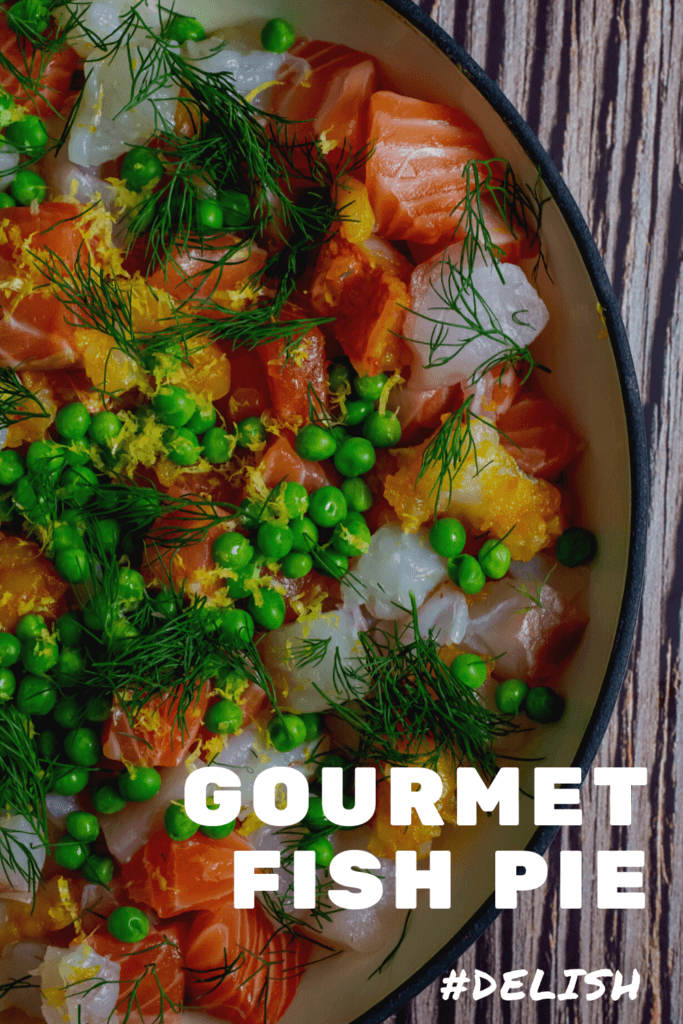 Raw fish, peas & dill in a pan for fish pie