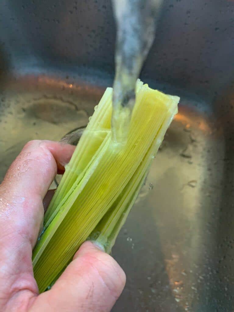 Leeks being cleaned