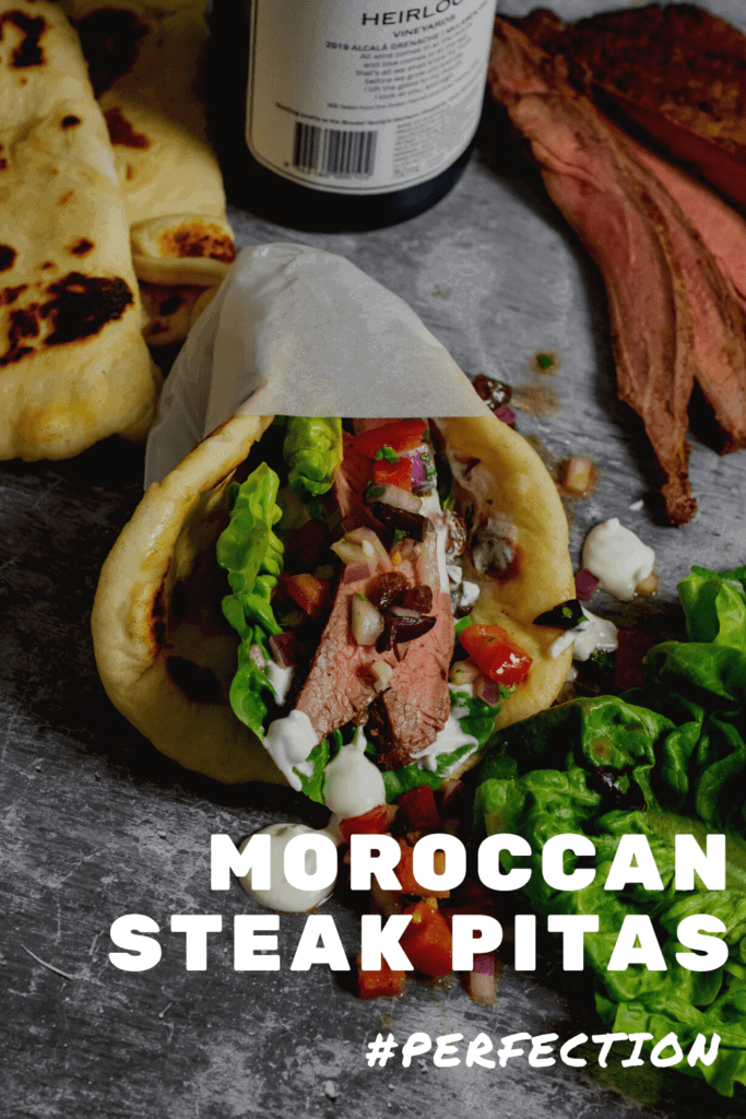 Moroccan steak pita with salsa, steak & red wine in background