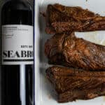 seared short ribs & bottle of seabrook cabernet sauvignon