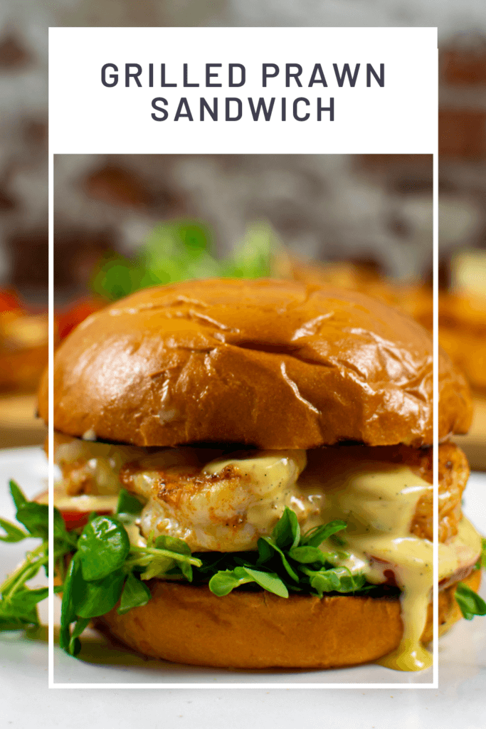 grilled prawn sandwich on a white plate