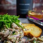 braised ham hock salad on a made of australia plate with jackson brooke chardonnay