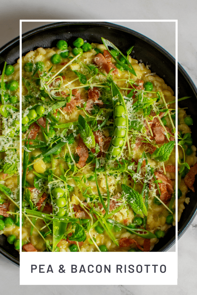 pea & baco risotto in a black bowl