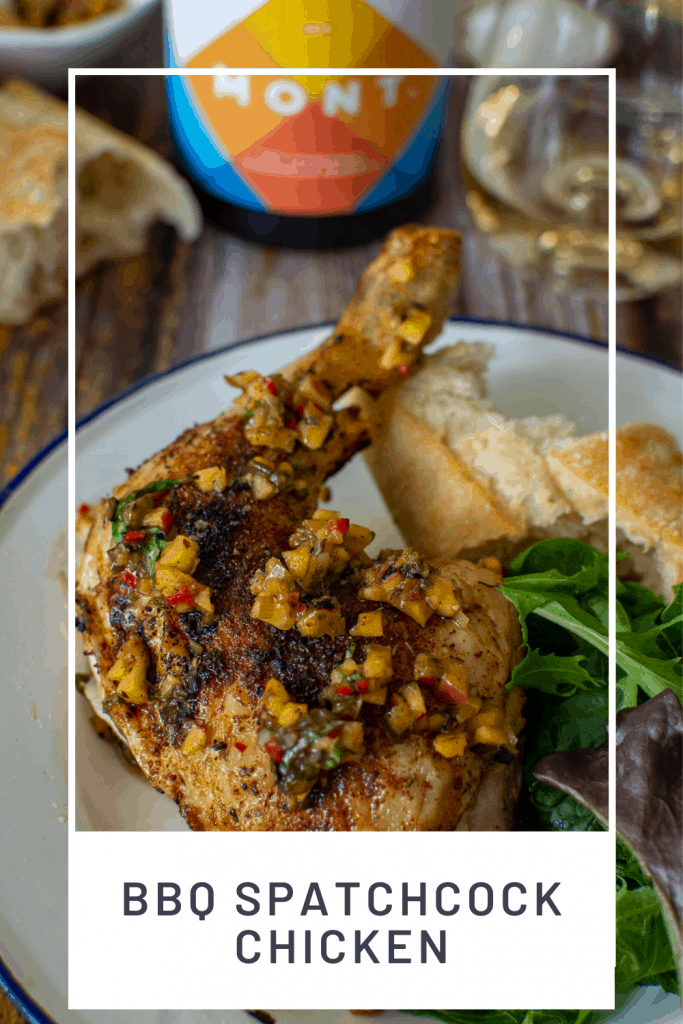 Mont wines, bbq spatchcock chicken & bread on a picnic table