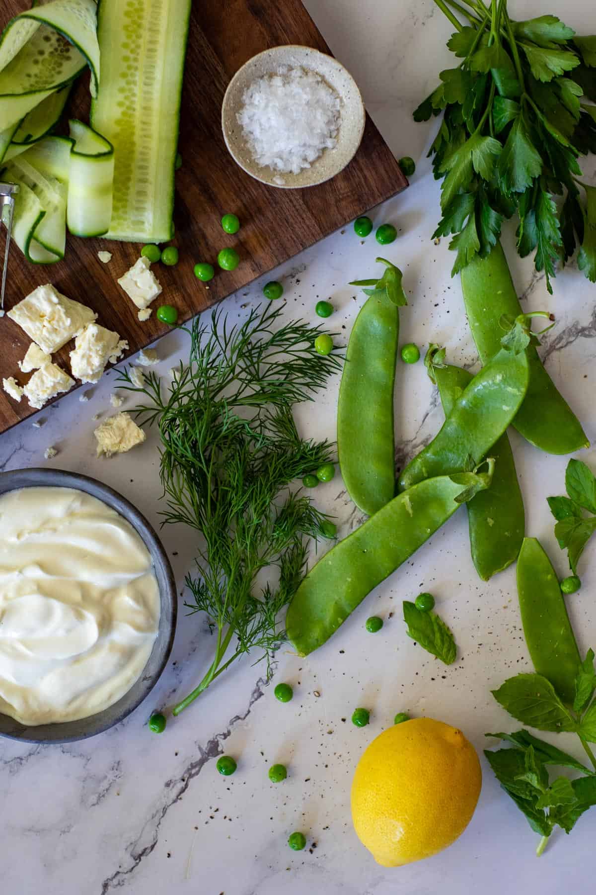 English pea salad ingredients on kitchen counter top
