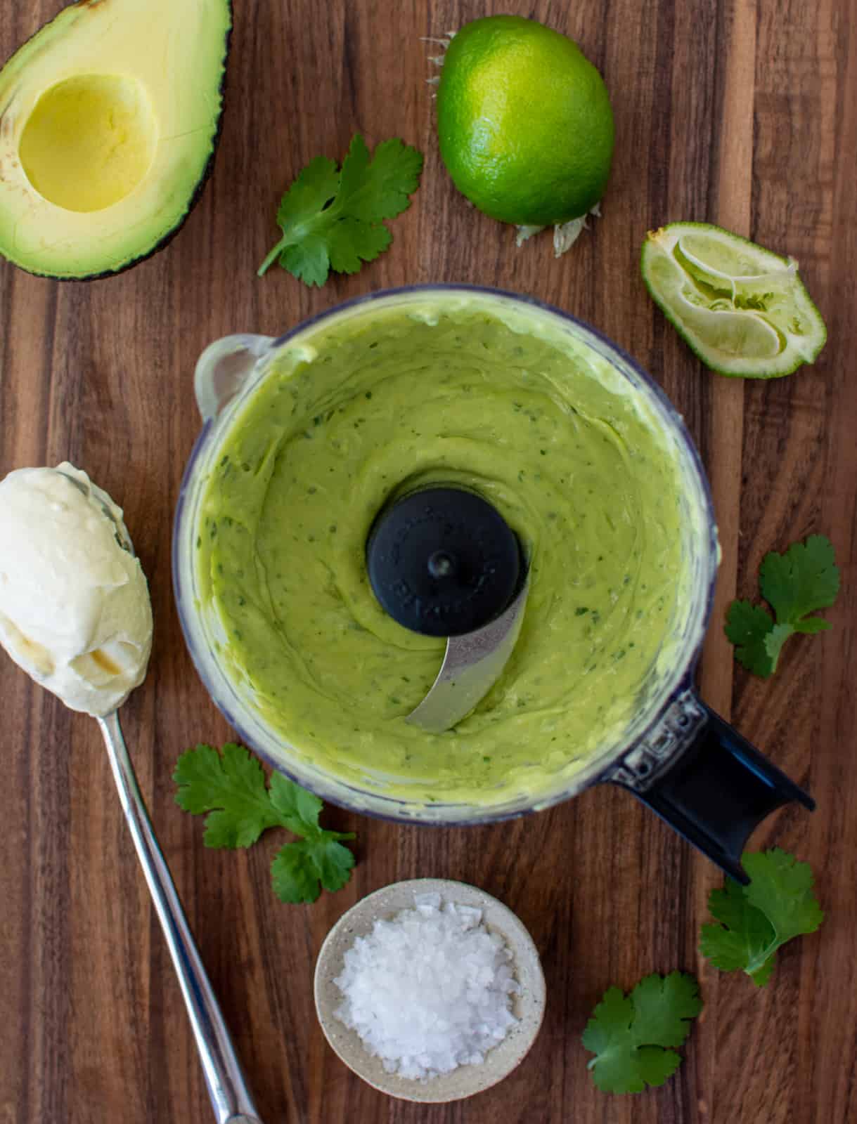 avocado crema and ingredients on a chopping board