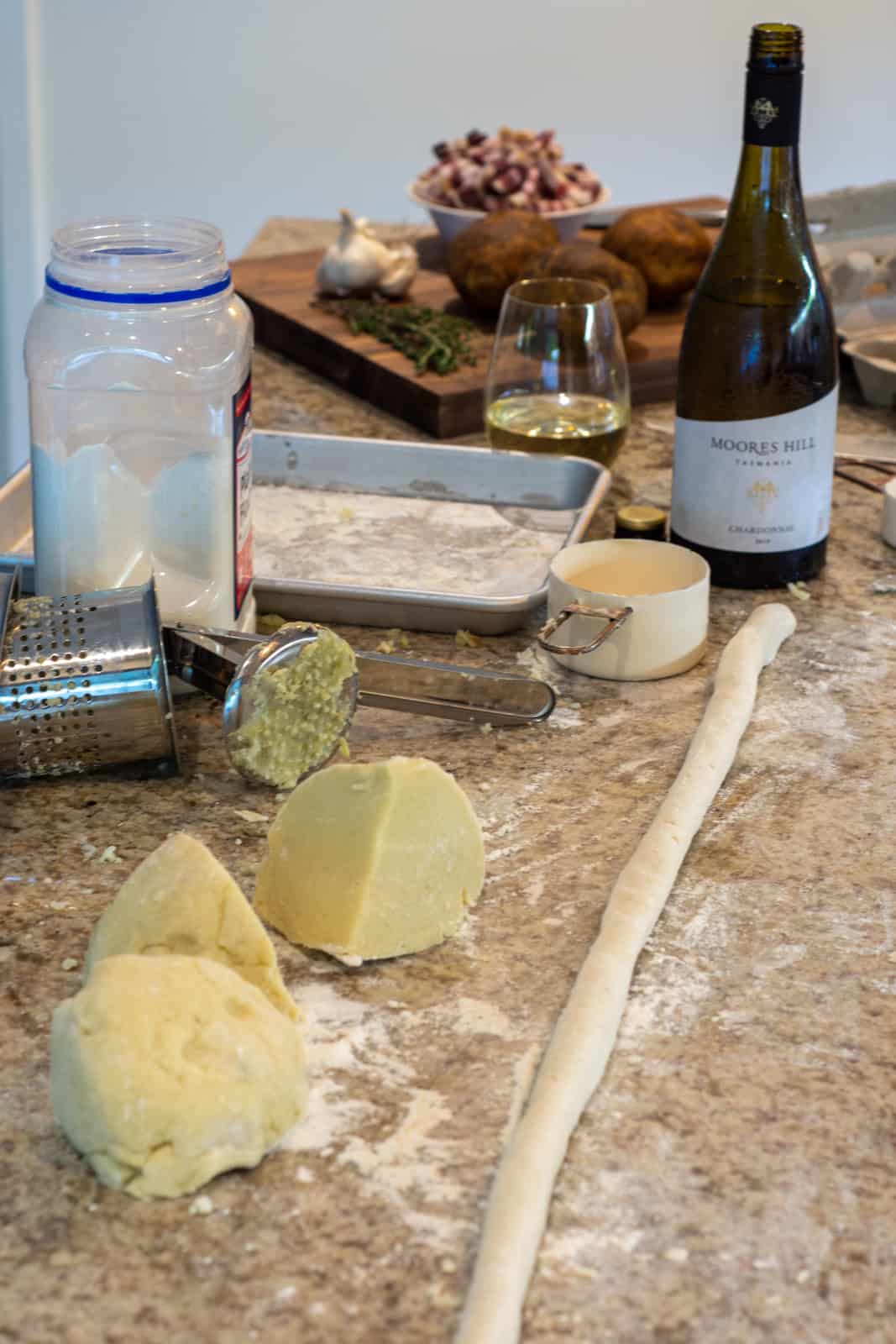 gnocchi being rolled on a kitchen worktop