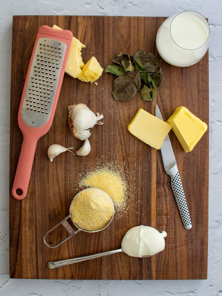 cheesy polenta ingredients on a chopping board