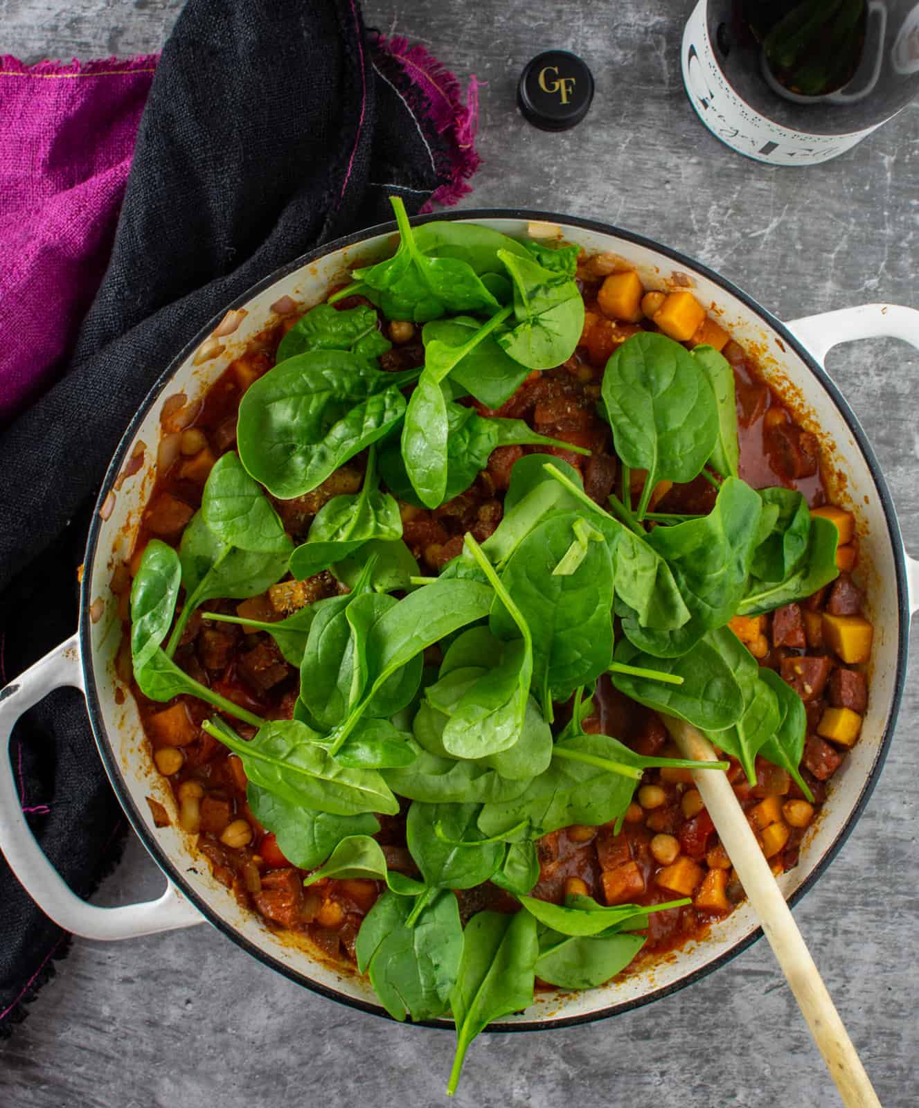 spinach and chickpea stew in a casserole dish