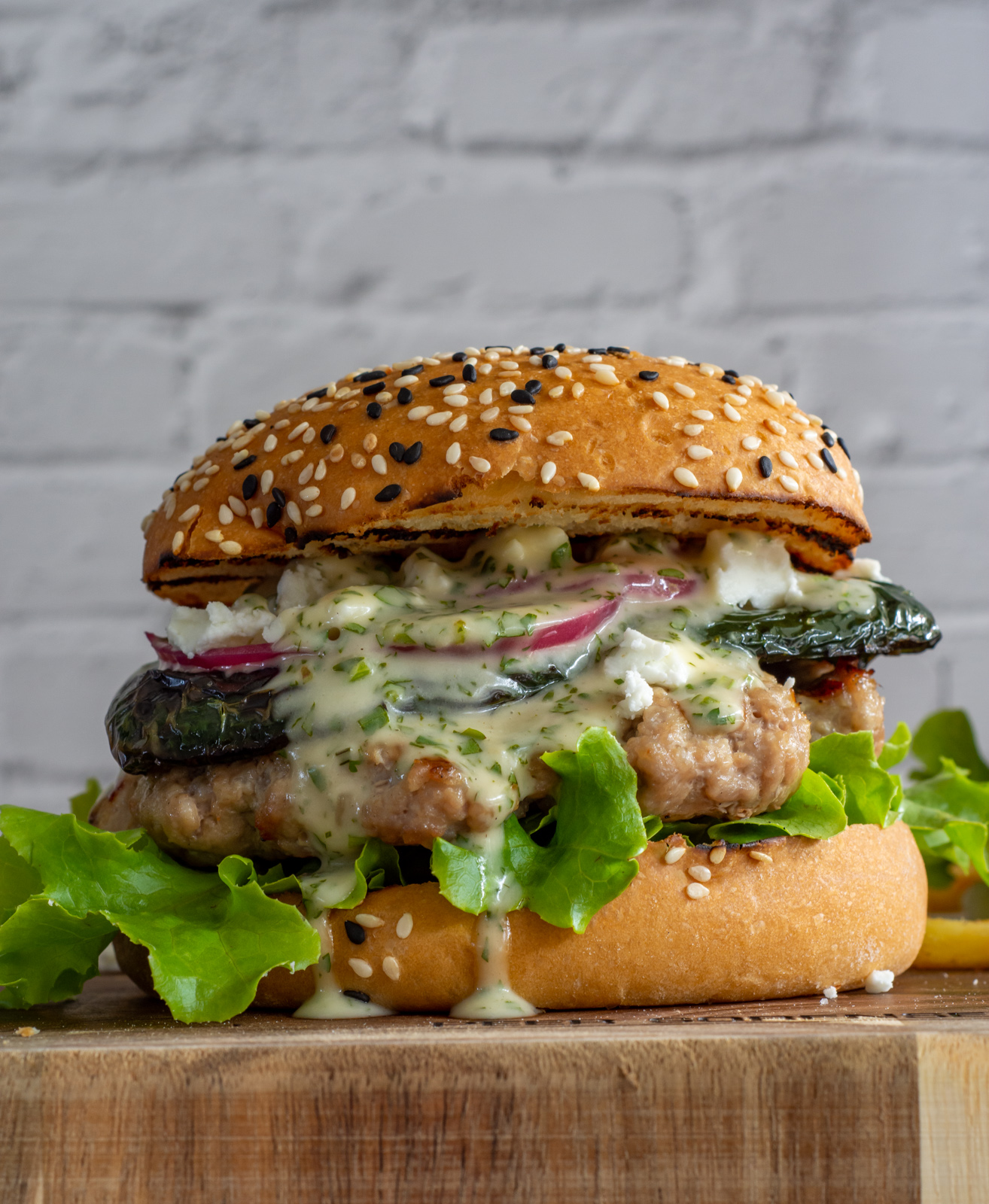 Mexican pork burger on a wooden board