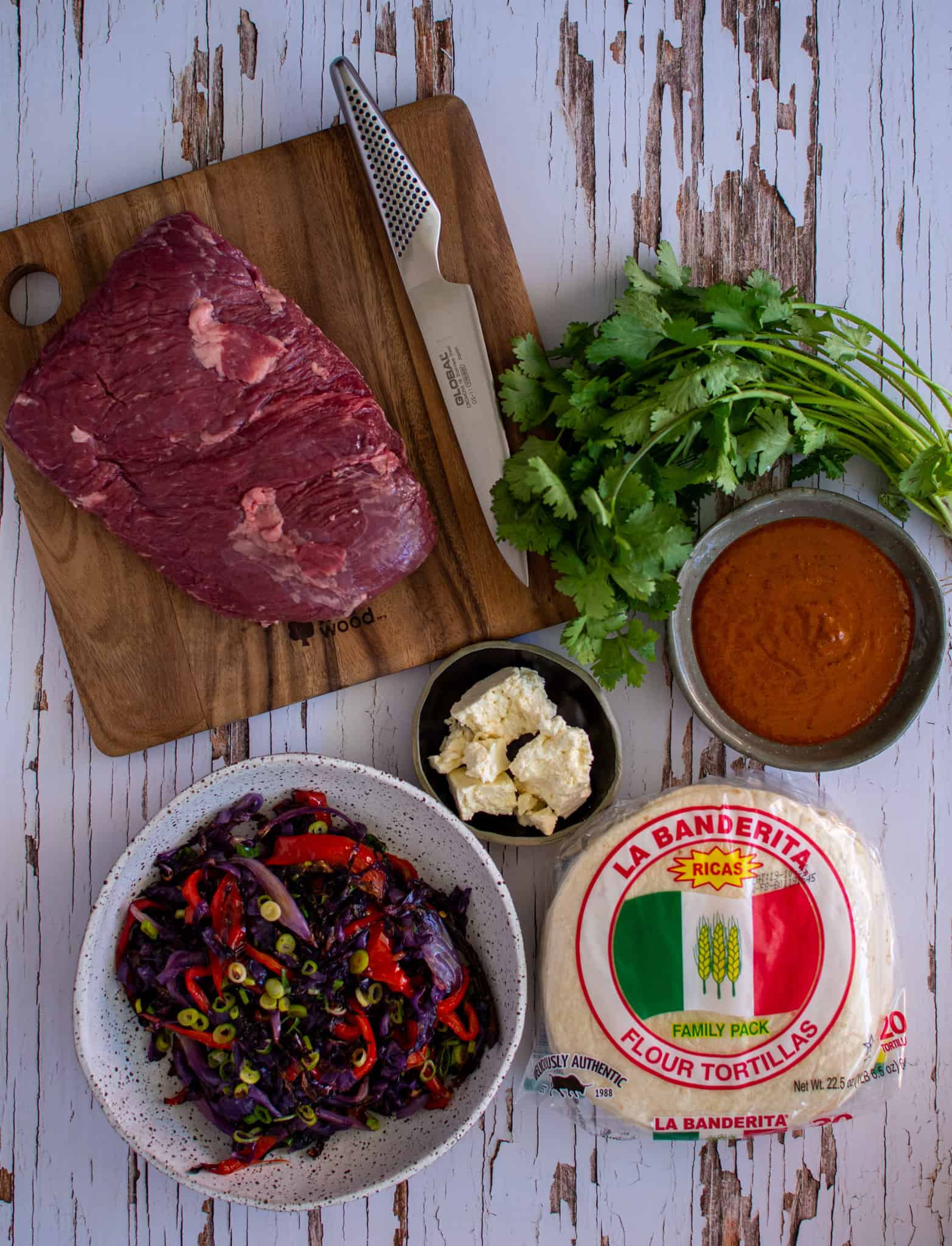 Birdseye view of ingredients needed to make bavette steak tacos, chipotle orange sauce